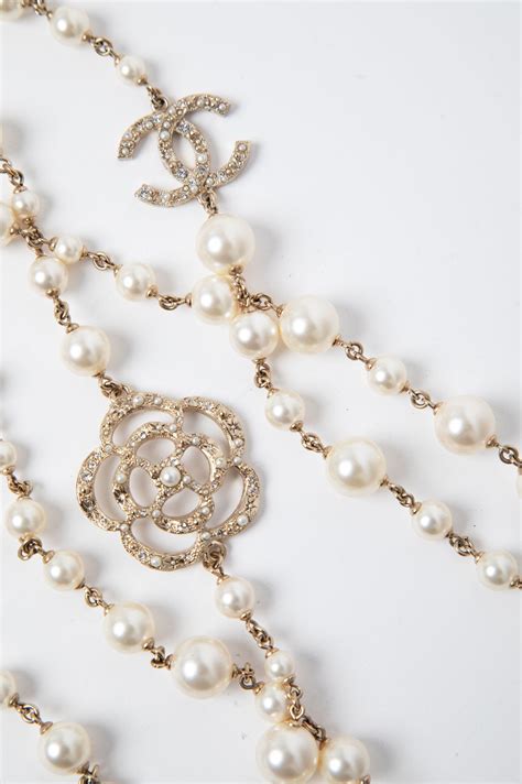 chanel clear camellia brooch|chanel pearl brooch price.